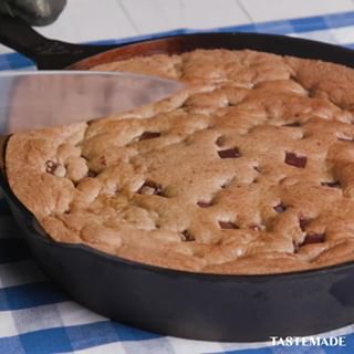How to make a giant nutella-stuffed chocolate chip cookie. ⁠
⁠
Nutella-Stuffed Chocolate Chip Pizookie⁠
Ingredients:⁠
1 cup unsalted butter, softened⁠
1 cup white sugar⁠
1 cup light brown sugar⁠
2 teaspoons vanilla extract⁠
2 large eggs⁠
3 cups all purpose flour⁠
1 teaspoon baking soda⁠
½ teaspoon baking powder⁠
1 teaspoon sea salt⁠
1½ cups chocolate chips (or chunks or chopped chocolate)⁠
½ cup Nutella⁠
⁠
Steps:⁠
1. Scoop Nutella into balls on wax paper and freeze.⁠
2. Preheat oven to 350 degrees. ⁠
3. In a separate bowl mix flour, baking soda, salt, baking powder. Set aside.⁠
4. Cream together softened butter and sugars until combined.⁠
5. Beat in eggs and vanilla until fluffy.⁠
6. Mix in the dry ingredients until combined.⁠
7. Add 1½ cups chocolate chunks and mix well.⁠
8. Spread half of the dough mixture into a 12-inch cast iron skillet. Sprinkle in the nutella, then cover with the remaining dough mixture. Bake for 20 mins, covered in foil, then uncover and bake for an additional 10 minutes. (The baking time will depend on the depth of your skillet. If you are using a 10-inch, it will cook longer than if you are using a 12 inch. Watch for the sides to get golden brown and slightly crispy)⁠